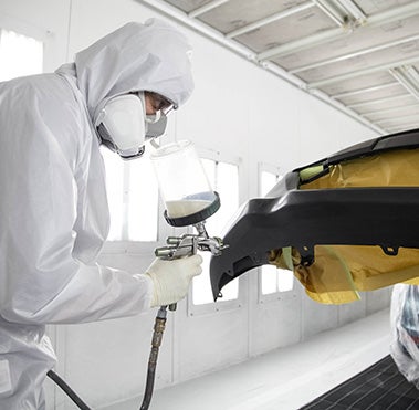 Collision Center Technician Painting a Vehicle | Toyota Of Ardmore in Ardmore OK